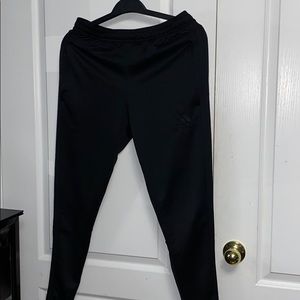 All black adidas track pants